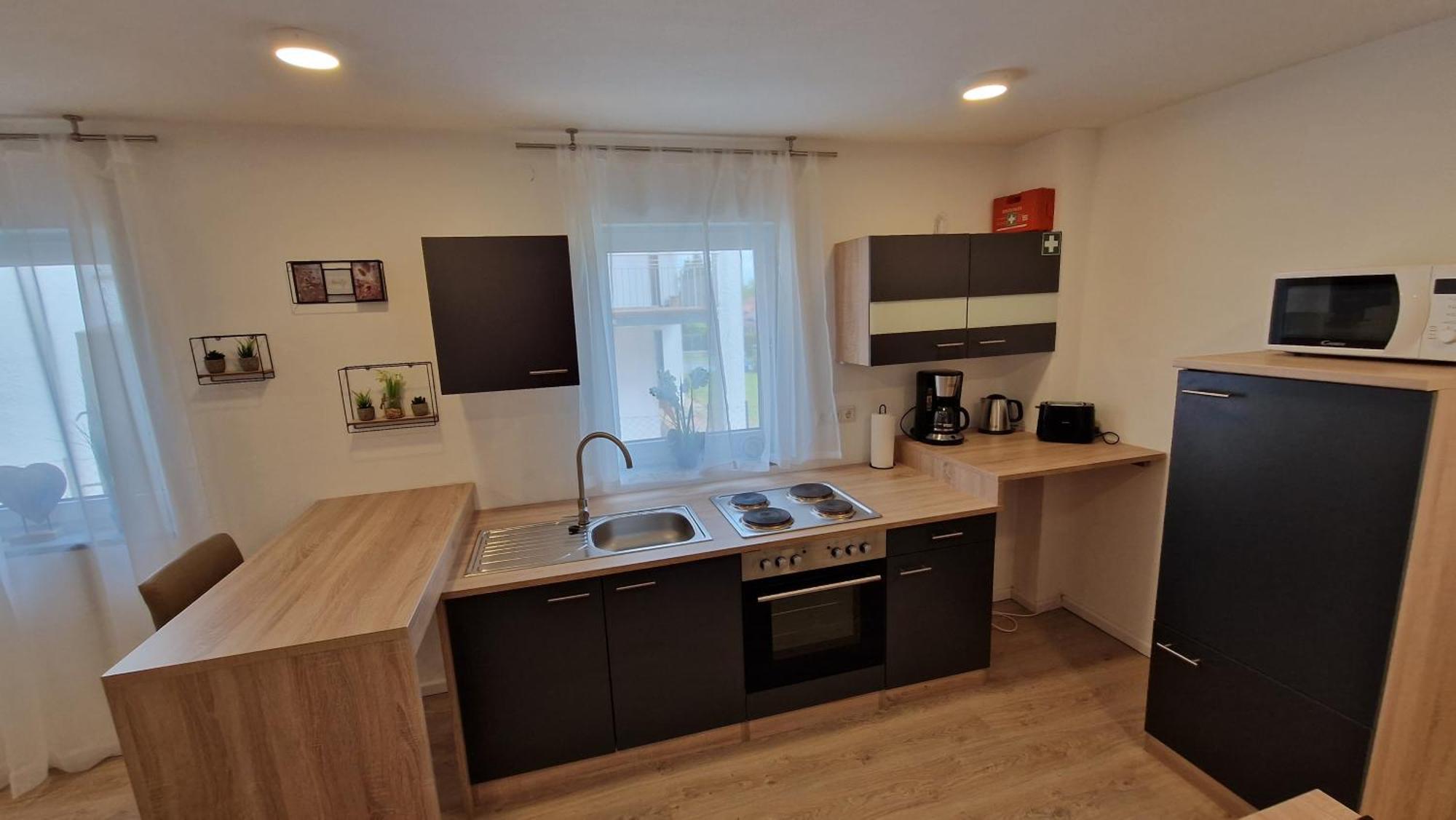 Appartment-Ferienwohnug mit Küche, Bad, kostenlos WLAN und Stellplatz, Modern eingerichtet Roding Habitación foto